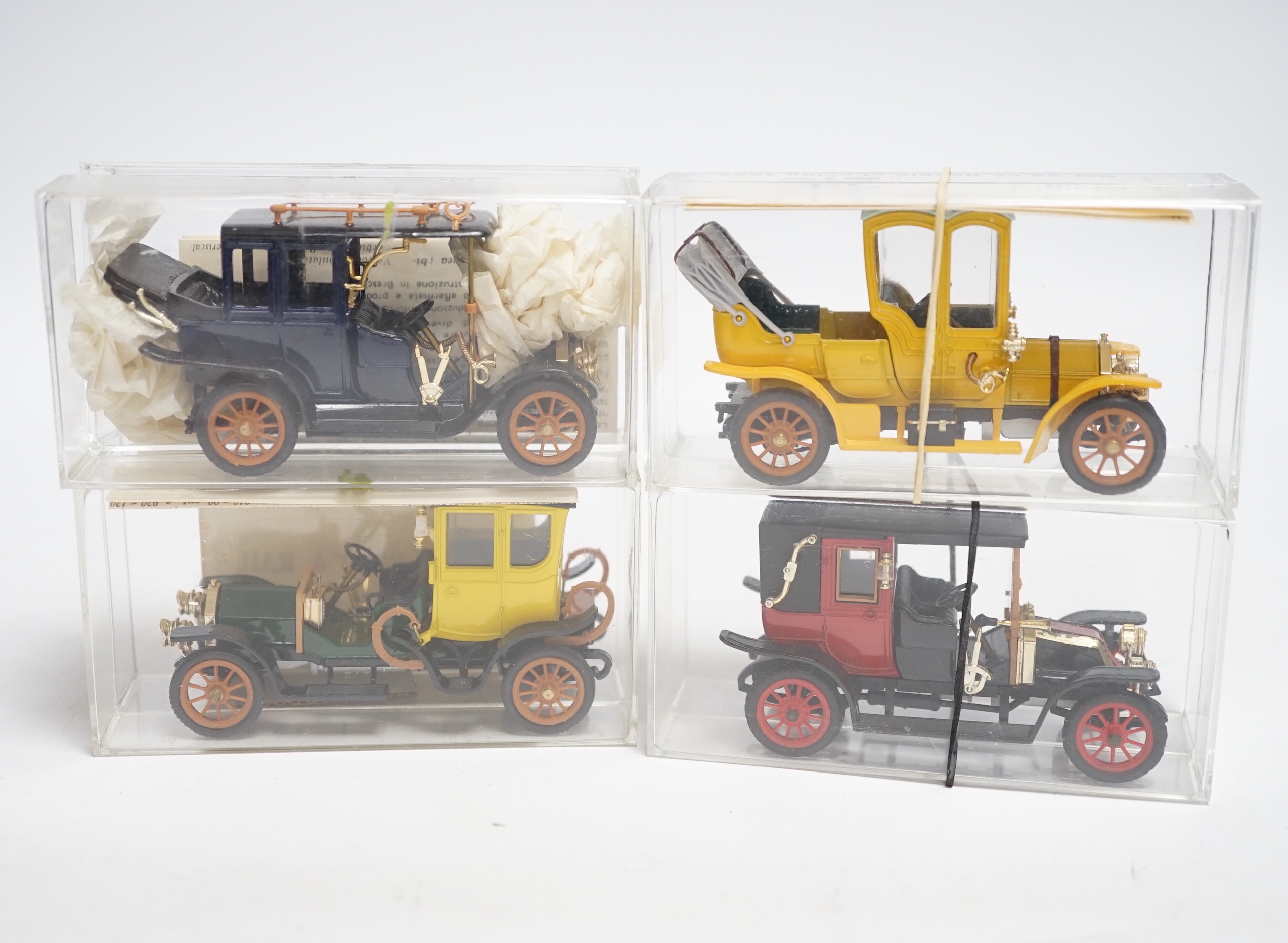 Twenty-one boxed Rio diecast models of veteran and vintage cars, together with two 1970s catalogues